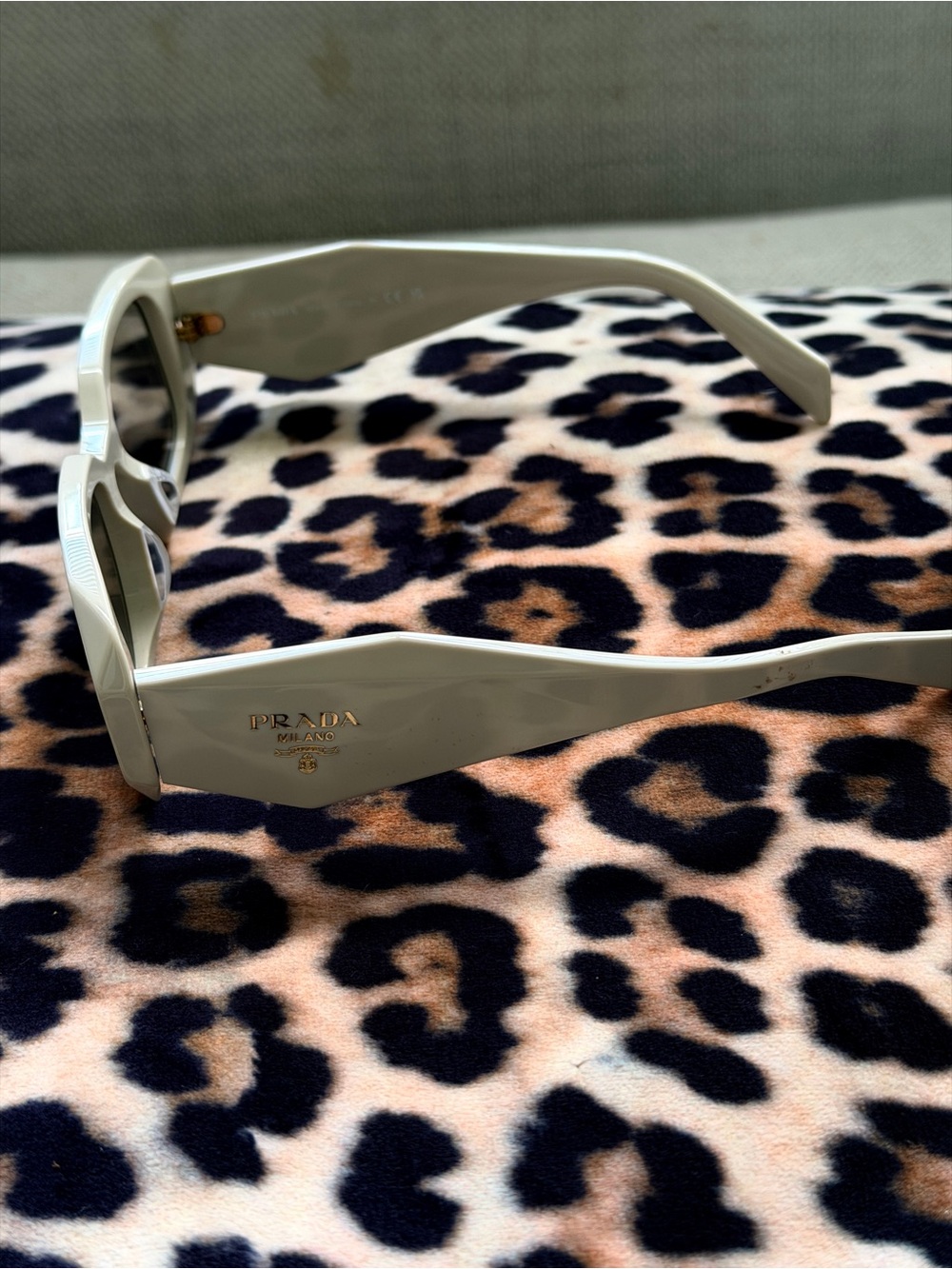 Prada Cream Sculpted Temple Sunglasses with Gold Logo